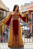 Velvet embellished with intricate Qasab (metallic) embroidery.