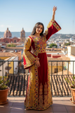 Velvet embellished with intricate Qasab (metallic) embroidery.