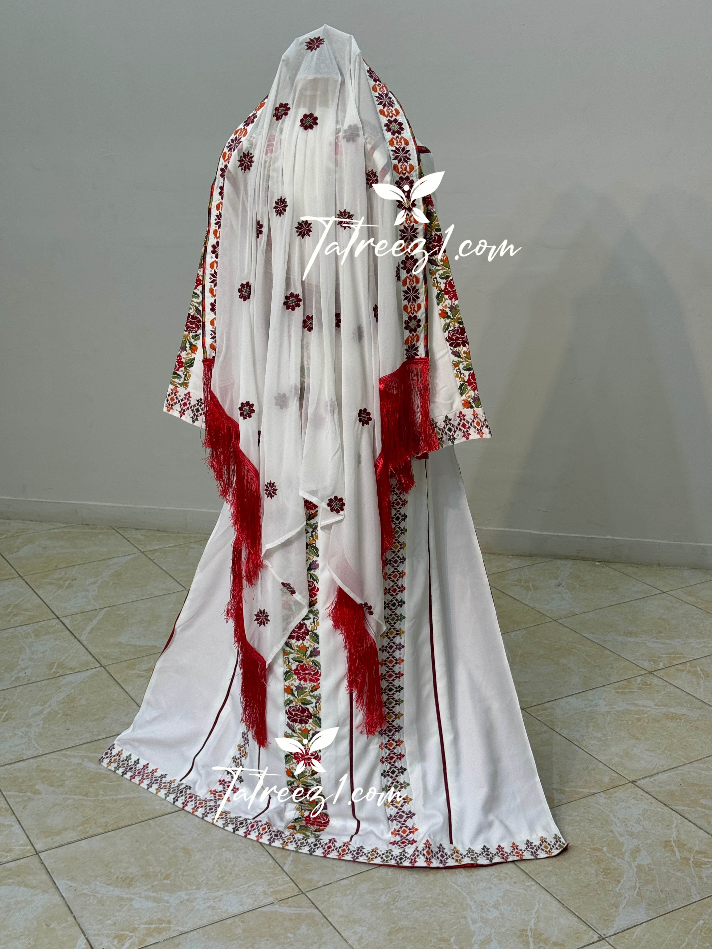 White Stunning Thoub with Floral Embroidery and Overskirt.