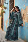 Elegant & Bold Emerald Palestinian Thoub glow amidst city colors.