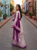 Elegant & Bold Palestinian Thoub glow amidst city colors.