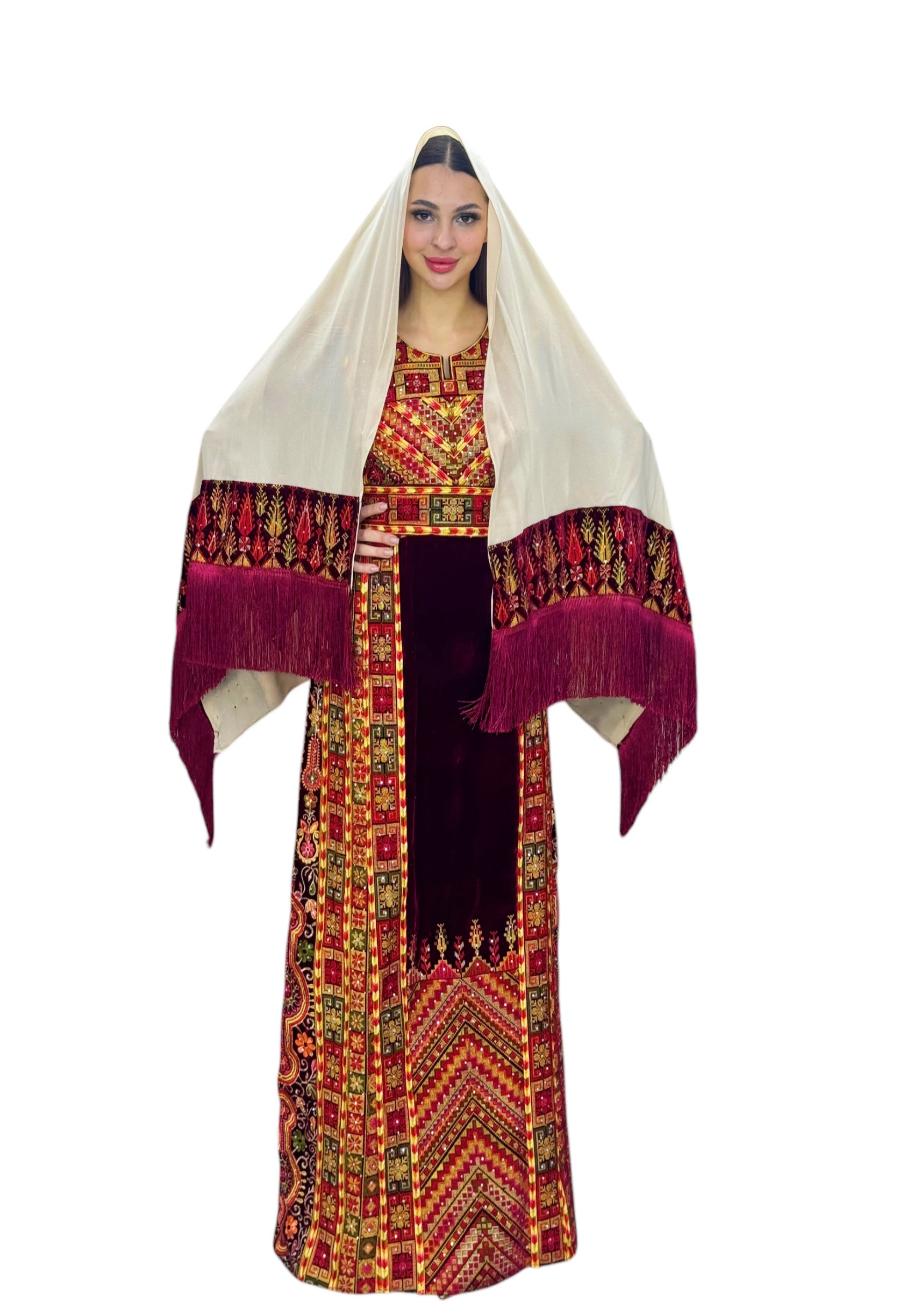 Maroon velvet Palestinian embroidered traditional long thobe with matching headpiece.