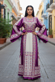 Elegant & Bold Palestinian Thoub glow amidst city colors.