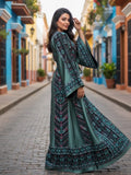 Elegant & Bold Emerald Palestinian Thoub glow amidst city colors.